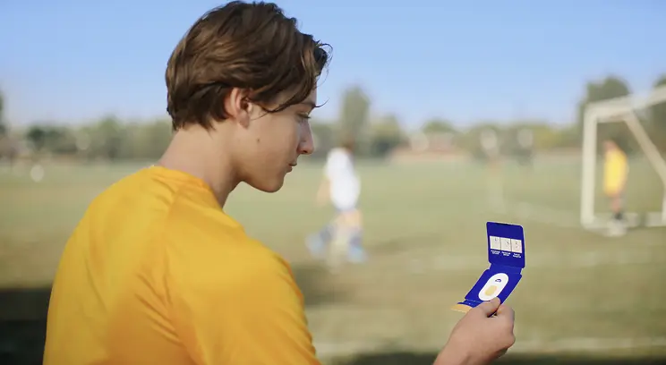 Hypothetical EKTERLY® (sebetralstat) patient at a sports game