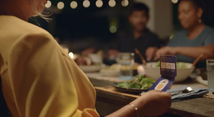 Hypothetical EKTERLY® (sebetralstat) patient at a dinner party