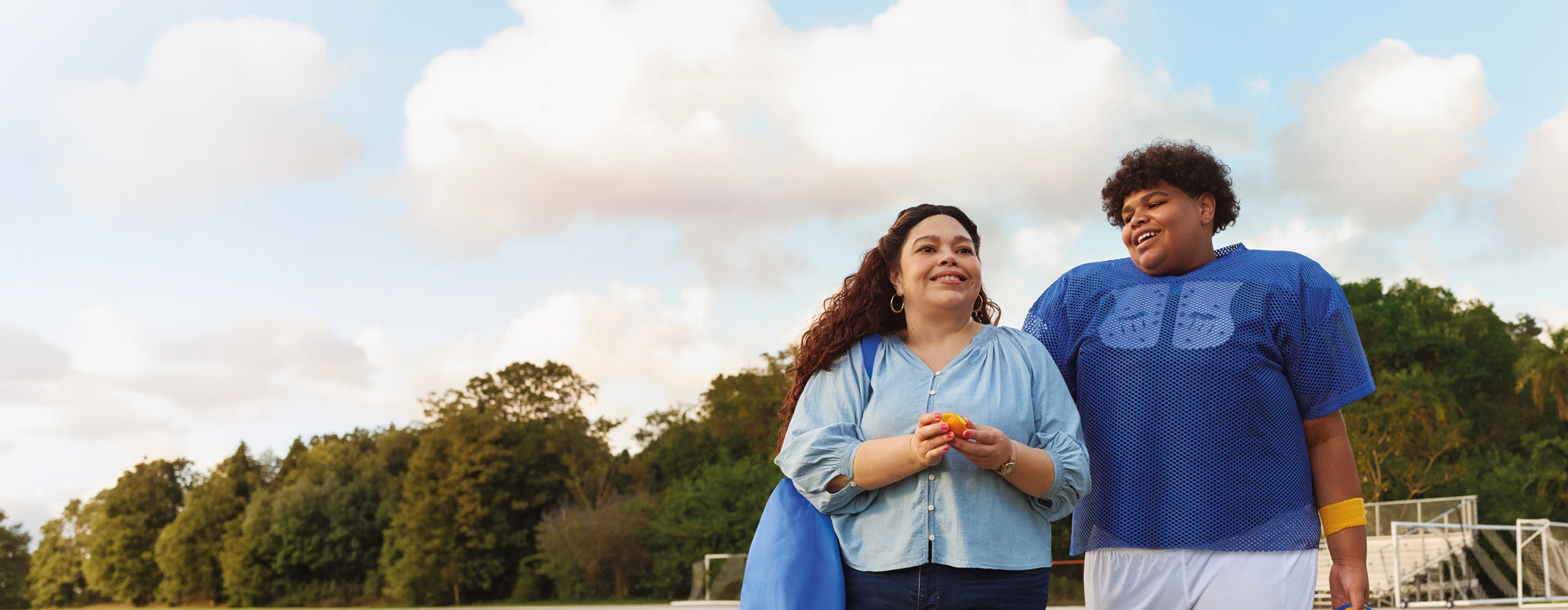 Real EKTERLY® (sebetralstat) patient Ellis at football practice with his mother, Hortencia