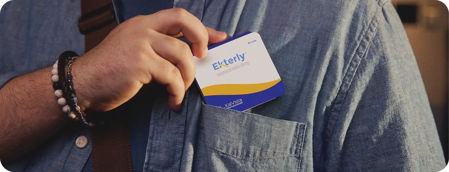 Hand holding EKTERLY® (sebetralstat) medication