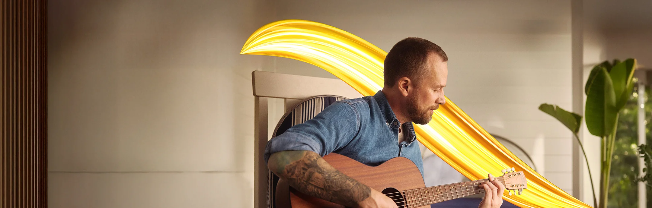 Real EKTERLY® (sebetralstat) patient Jason playing the guitar